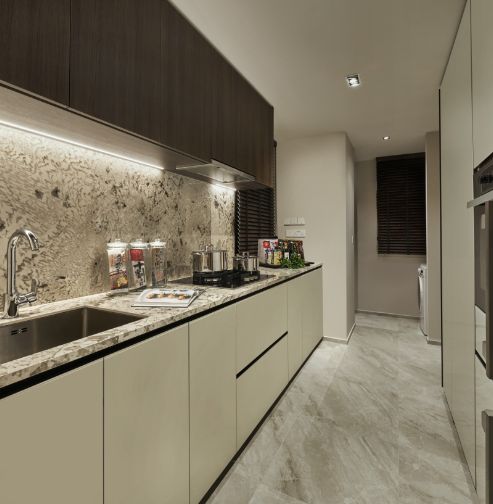 Sleek kitchen with a Miele hood, hob and oven, and Liebherr refrigerator.